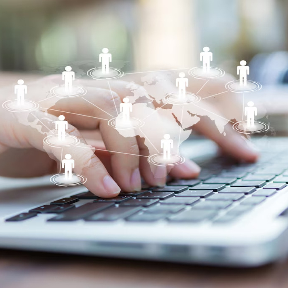 hands-with-laptop-virtual-world-map_1232-876 1